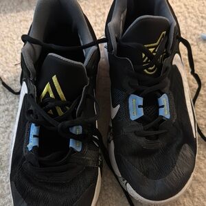 Nike Black and Gold Athletic Shoes